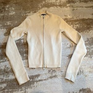 Cream ribbed zip up sweater by Brandy Melville